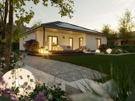 Winkelbungalow im Abendlicht mit großzügiger Dachfläche für eine Photovoltaiklösung